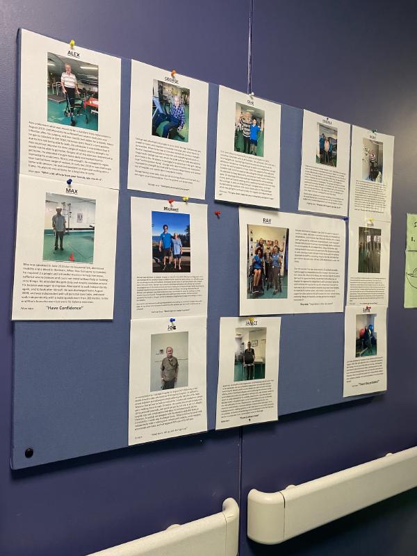A series of success story posters on a blue wall